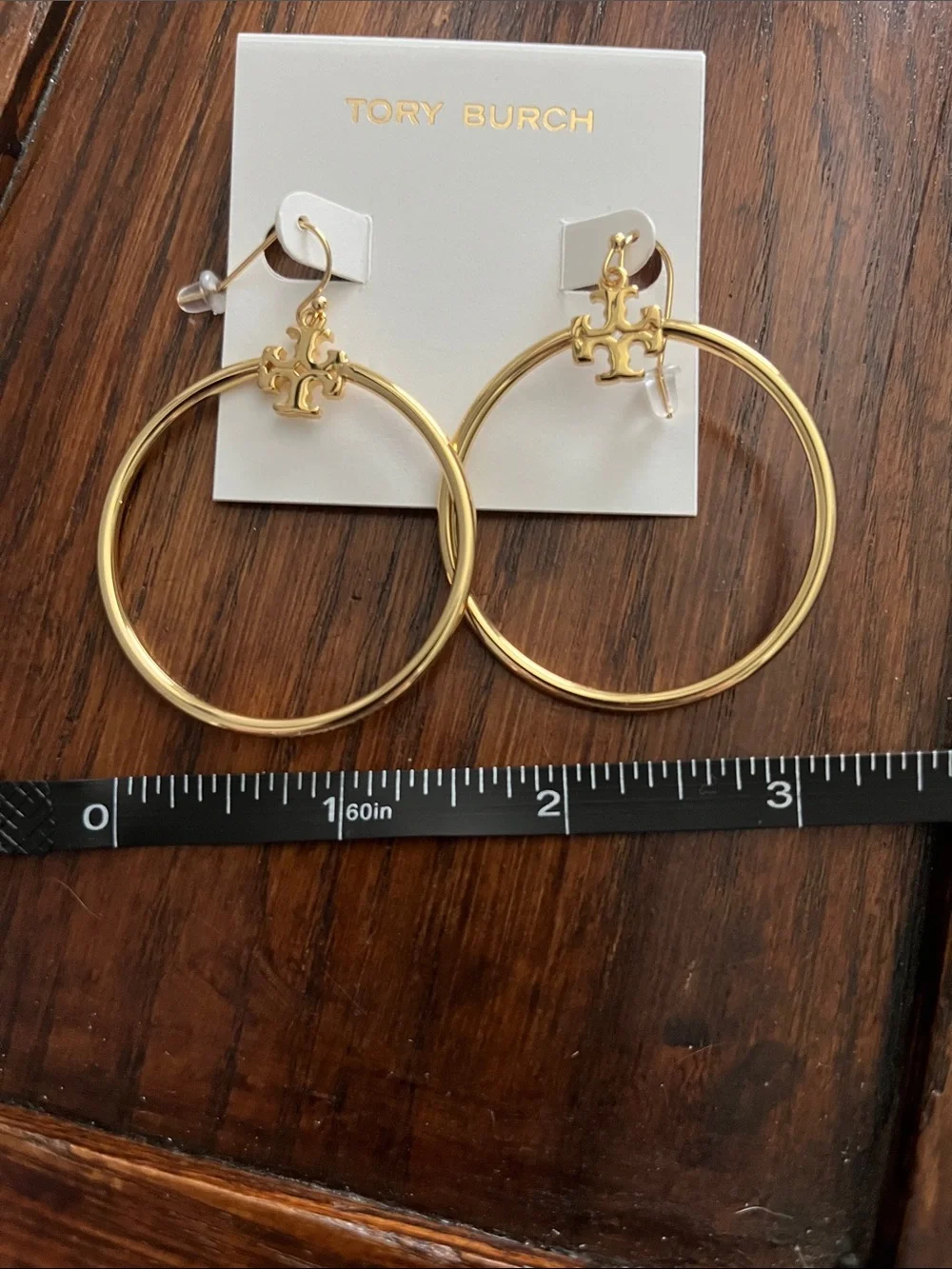 Tory Burch Polished Gold Tone Hoop Earrings with Logo Charm